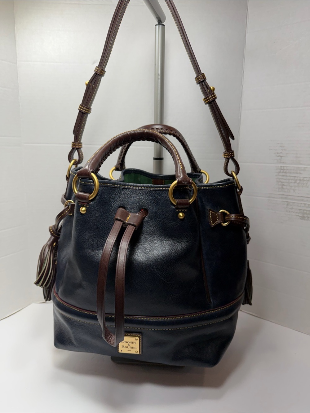 Dooney & Bourke Navy and Brown Leather Drawstring Tote with strap mint condition